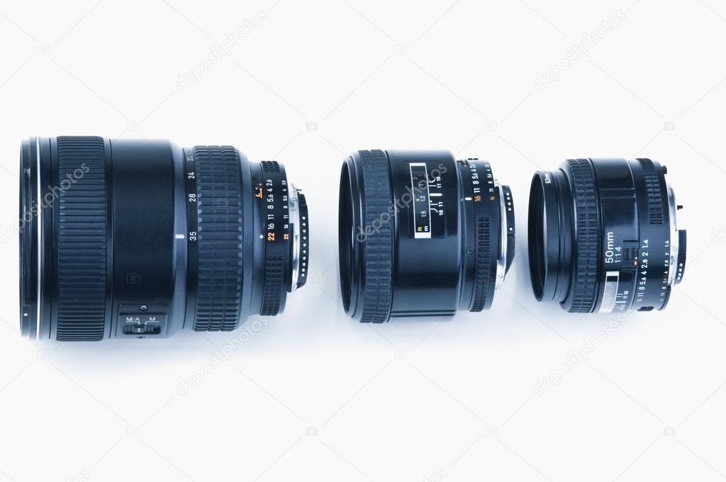 Three photographic lenses in a row