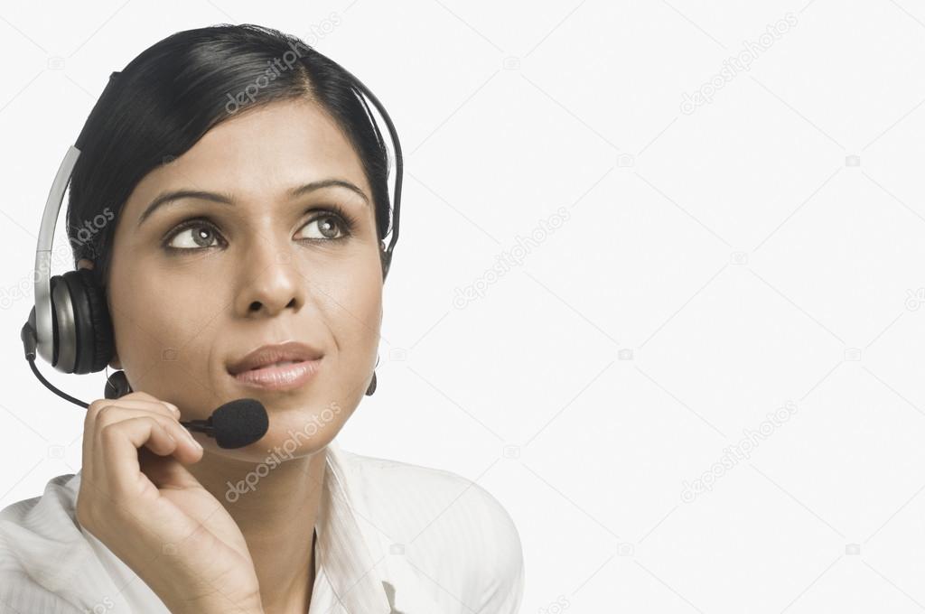 Female customer service representative thinking