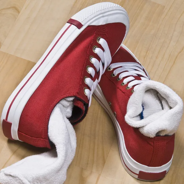 Pair of canvas shoes with socks — Stock Photo, Image