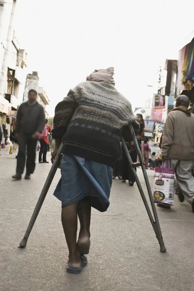 Disabled man in a street market — Stock Photo, Image