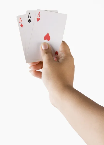 Mão segurando cartas de jogo — Fotografia de Stock