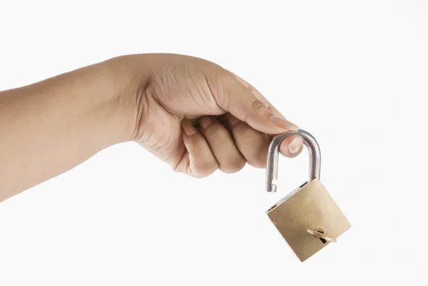 Hand holding a padlock — Stock Photo, Image