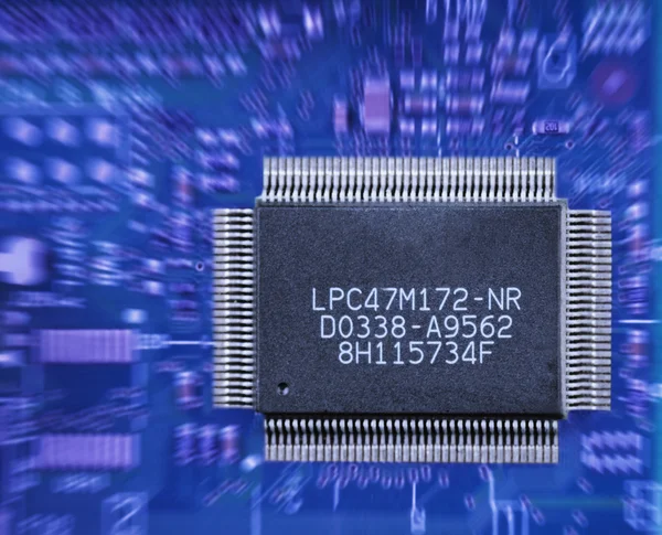 Computer chip on a circuit board — Stock Photo, Image