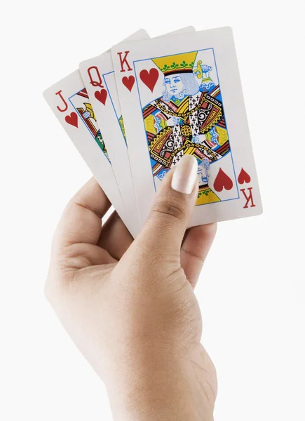 Mão segurando cartas de jogo — Fotografia de Stock