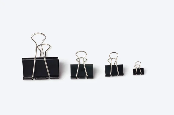 Binder clips in an ascending order — Stock Photo, Image