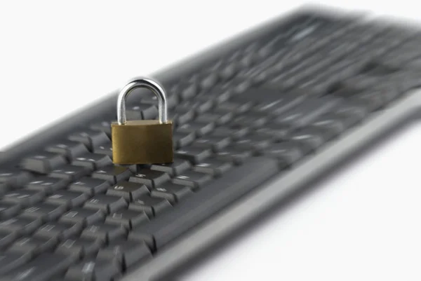 Padlock on a computer keyboard — Stock Photo, Image