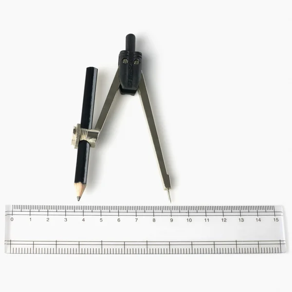 Lápis com uma bússola de desenho e uma régua — Fotografia de Stock