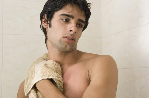 Man wiping himself with a towel — Stock Photo, Image