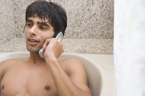 Man relaxing in the bathtub — Stock Photo, Image