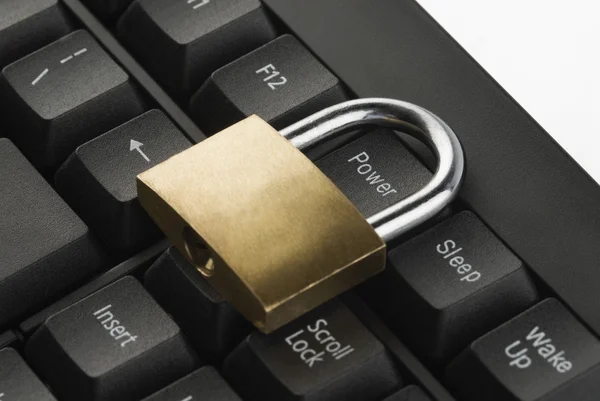 Padlock on a computer keyboard — Stock Photo, Image