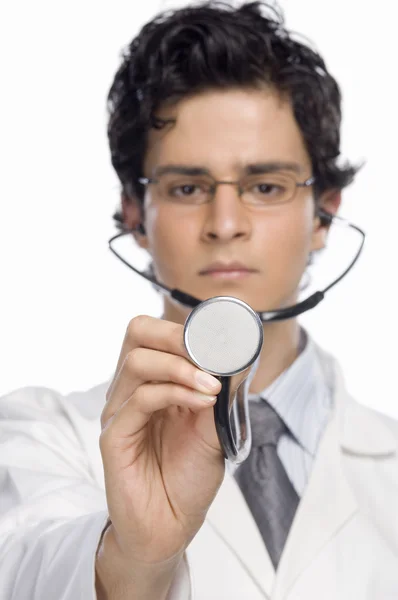 Doctor holding a stethoscope — Stock Photo, Image