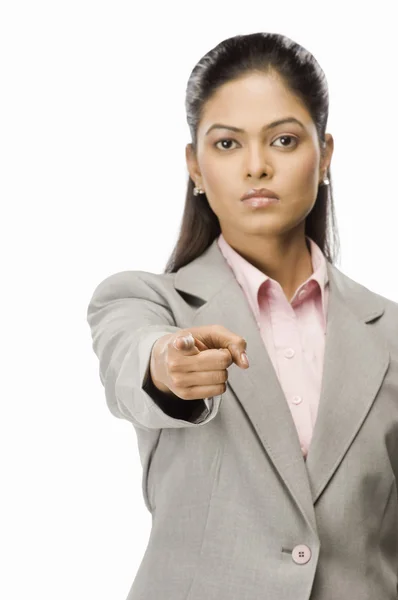 Businesswoman pointing forward — Stock Photo, Image