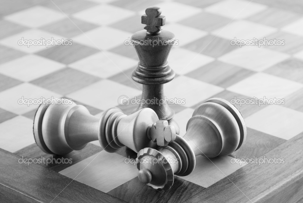 Close-up of chess pieces on a chessboard