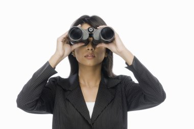 Businesswoman looking through binoculars clipart