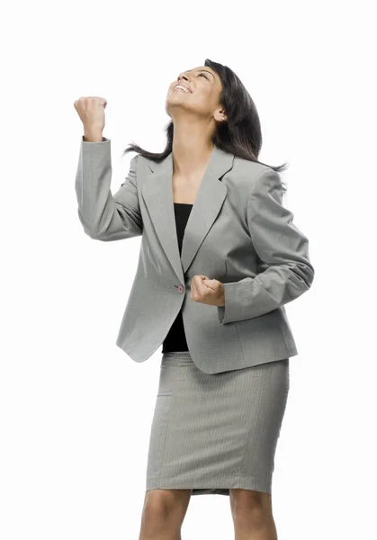 Businesswoman clenching her fist with joy — Stock Photo, Image