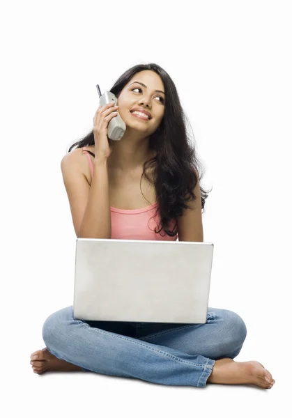 Woman using a laptop — Stock Photo, Image