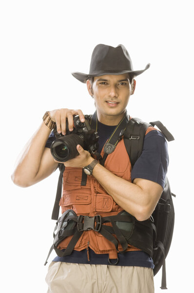 Photographer holding a digital camera