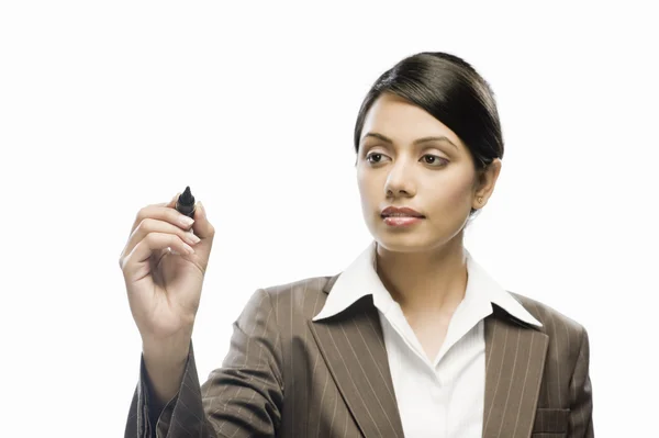 Businesswoman writing on a blank space — Stock Photo, Image