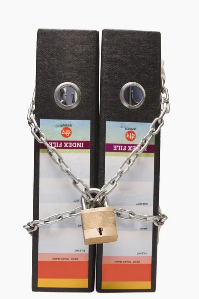 Files tied up with chain and a padlock — Stock Photo, Image