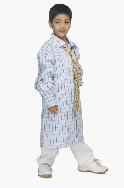 Boy wearing oversized shirt and tie — Stock Photo, Image