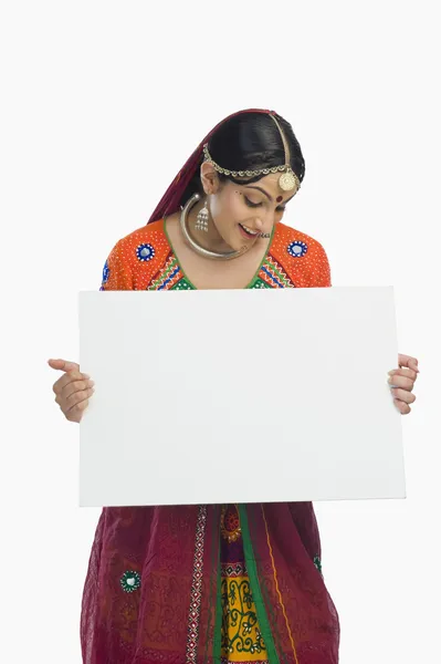 Woman holding a placard — Stock Photo, Image