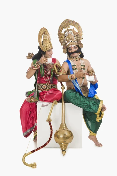 Two men dressed-up as Rama and Ravana — Stock Photo, Image