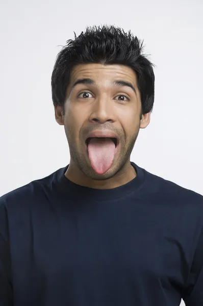 Man sticking his tongue out — Stock Photo, Image