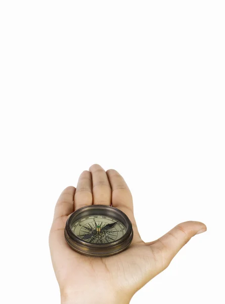 Рука, держащая компас — стоковое фото