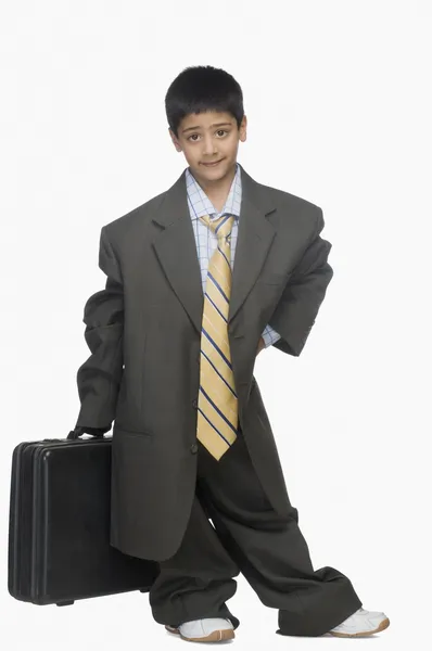 Boy wearing oversized suit Royalty Free Stock Photos