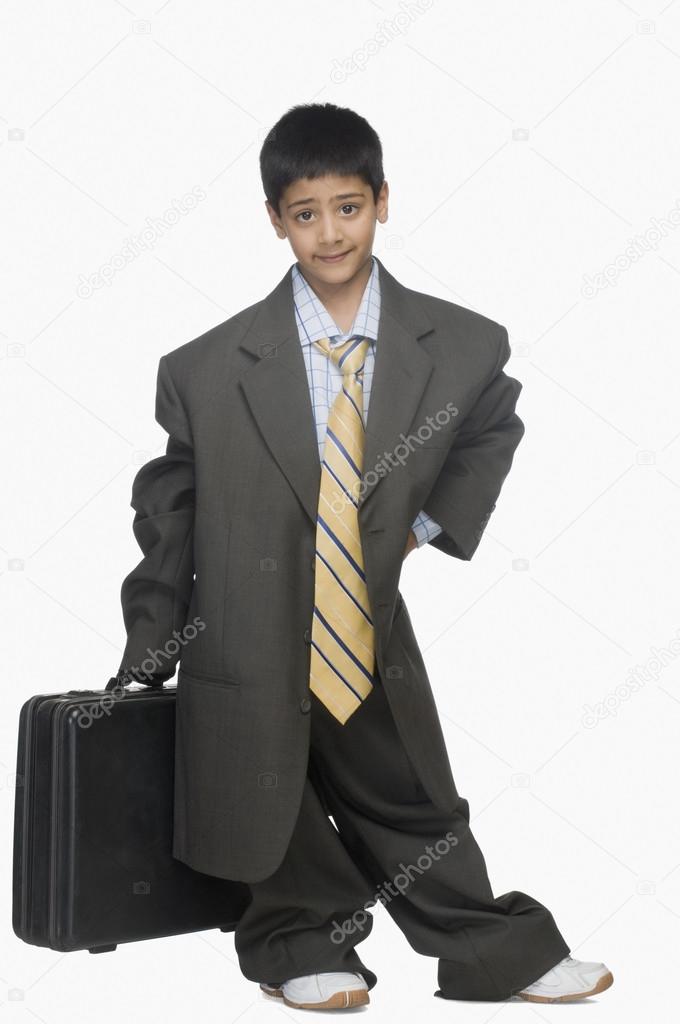 Boy wearing oversized suit Stock Photo by ©imagedb_seller 32967889