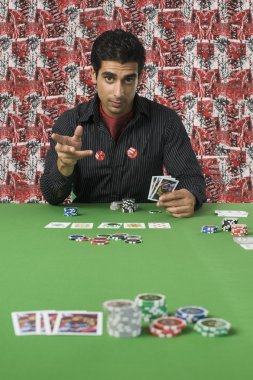 Man gambling in a casino clipart
