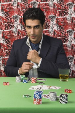 Man gambling in a casino clipart