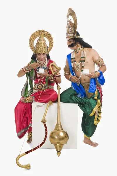 Two men dressed-up as Rama and Ravana — Stock Photo, Image