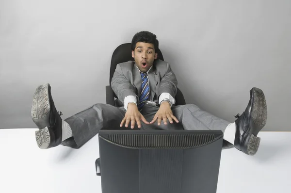 Businessman looking surprised — Stock Photo, Image