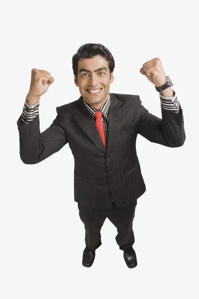 Businessman with his arms raised — Stock Photo, Image