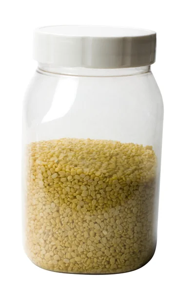 Close-up of red lentil in a plastic jar — Stock Photo, Image