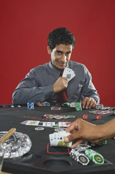 Man gambling in a casino — Stock Photo, Image