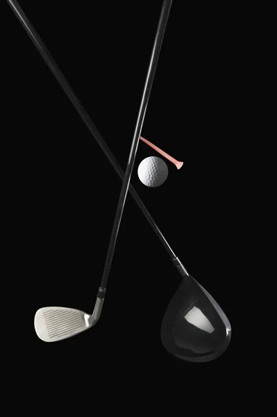 Close-up of golf clubs with a golf ball — Stock Photo, Image