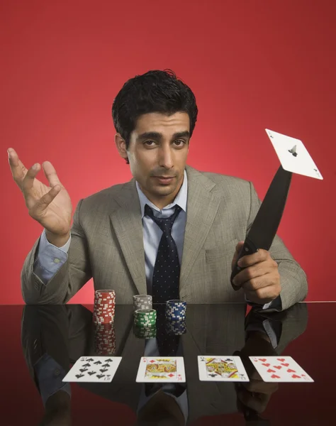 Man gambling in a casino — Stock Photo, Image