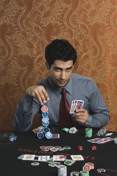 Man gambling in a casino — Stock Photo, Image