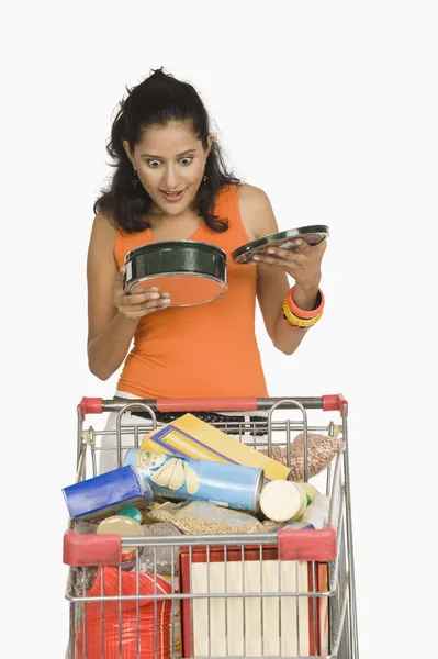 Woman holding a container — Stock Photo, Image