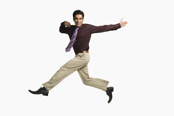 Businessman leaping — Stock Photo, Image