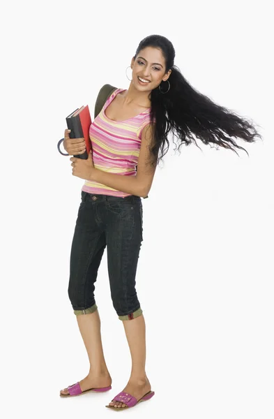 Student carrying books — Stock Photo, Image