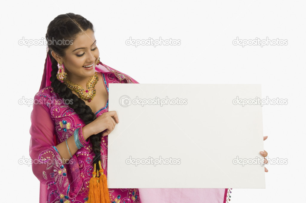 Woman holding a blank placard