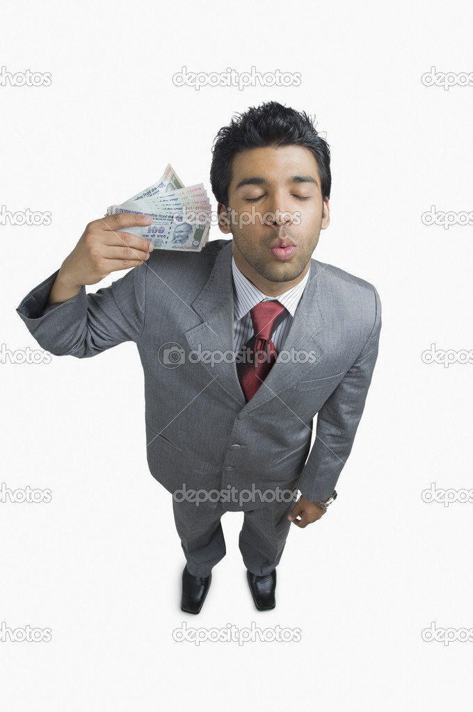 Businessman holding money