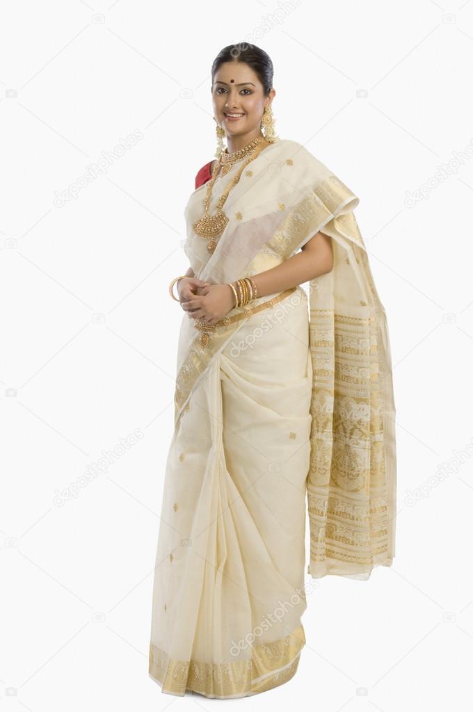 Woman wearing jewelry and sari