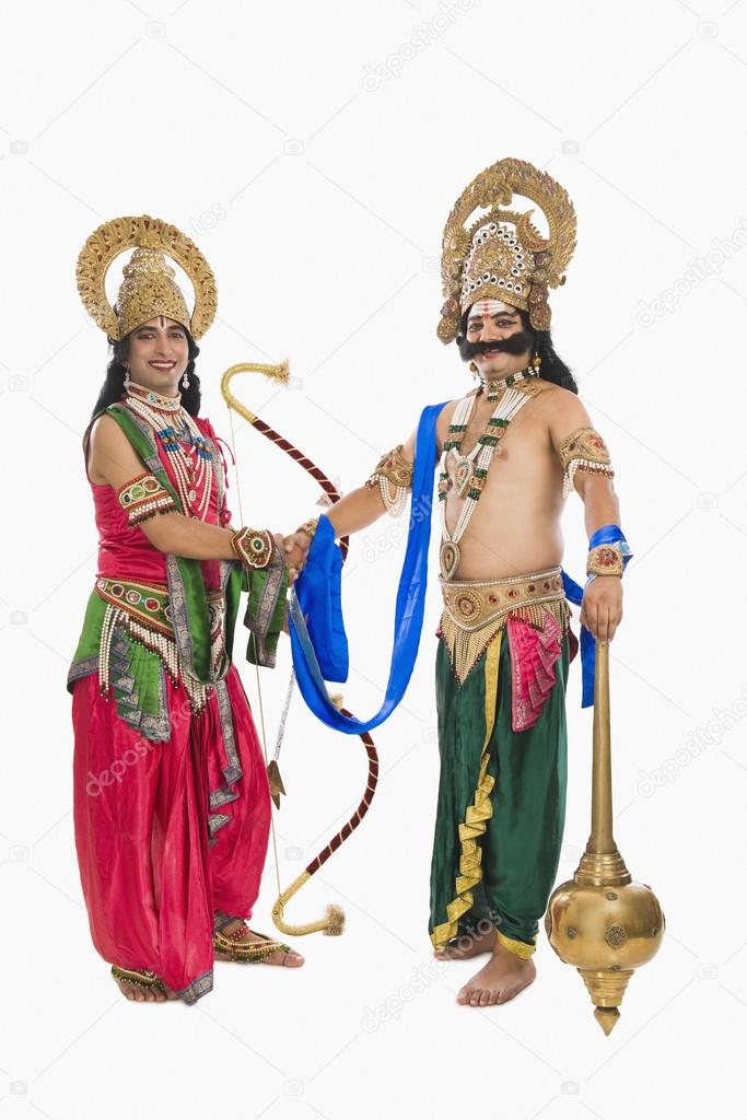 Two stage artists dressed-up as Rama and Ravana