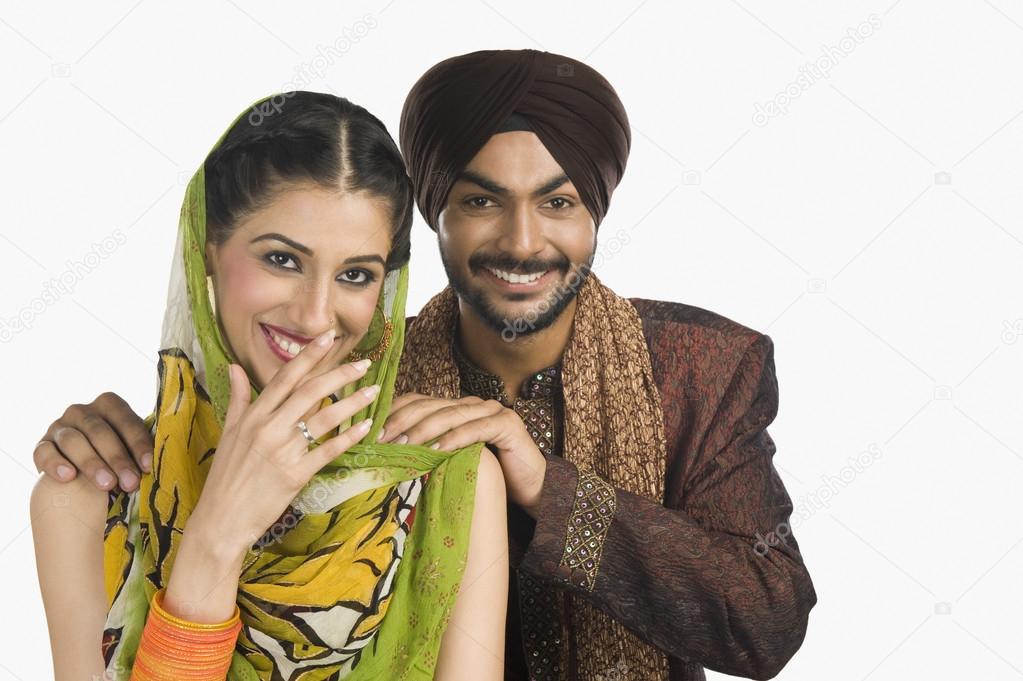 Sikh couple smiling