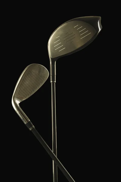Close-up of golf clubs with a golf ball — Stock Photo, Image