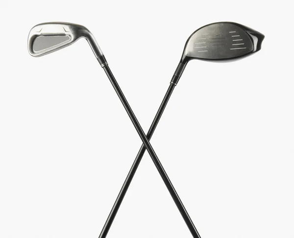 Крупный план двух клюшек для гольфа — стоковое фото